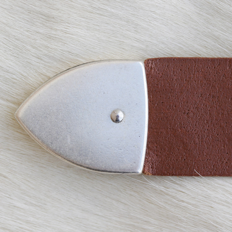For extra security, hammer the pin into the leather