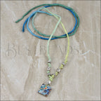 Sample used as a necklace, knotted and with beads