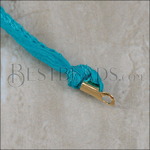 Shown tied and clamped with 5mm round crimp