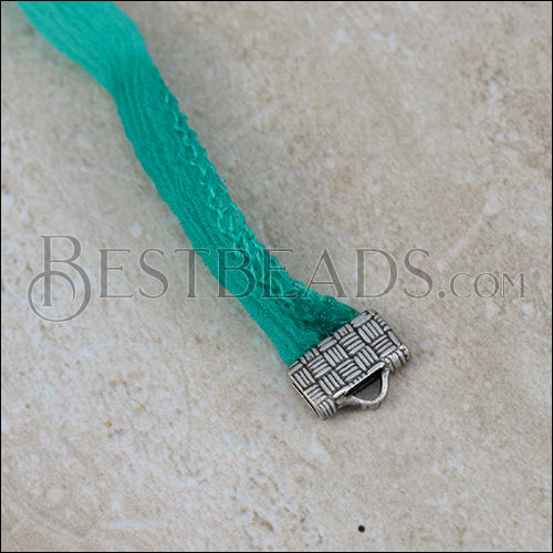 Shown clamped with 10mm ribbon crimp
