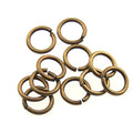 10mm jump ring ANT. BRASS - per ounce