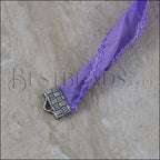 Shown clamped in a 10mm ribbon crimp