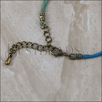 Shown with 2mm round crimp end with loop